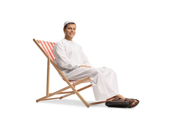 Young Man Ethnic Clothes Sitting Beach Chair Isolated White Background — Stock Photo, Image