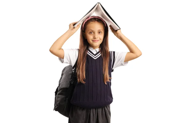 Colegiala Con Una Mochila Escondida Bajo Libro Aislado Sobre Fondo —  Fotos de Stock