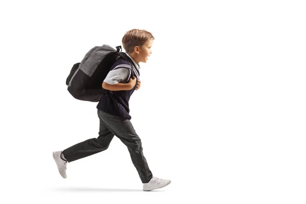 Volledige Lengte Profiel Shot Van Een Schooljongen Een Uniform Loopt — Stockfoto