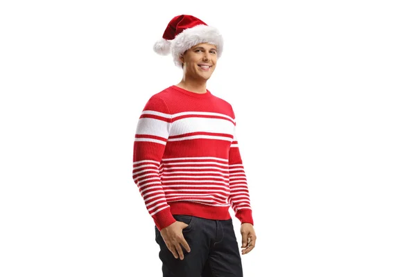 Jongeman Met Een Kerstmuts Een Rode Trui Een Witte Achtergrond — Stockfoto