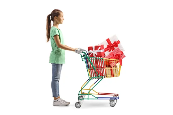 Full Length Profile Shot Girl Tanding Shopping Cart Full Wrapped — Zdjęcie stockowe