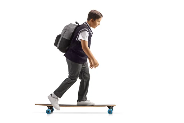 Profilo Completo Uno Scolaro Uniforme Cavalcando Uno Skateboard Isolato Sfondo — Foto Stock