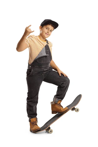 Full Length Portrait Boy Stepping Skateboard Gesturing Rock Roll Sign — Stock Photo, Image