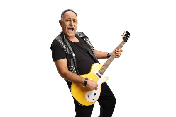 Glimlachende Volwassen Rock Gitarist Een Lederen Vest Spelen Een Gele — Stockfoto