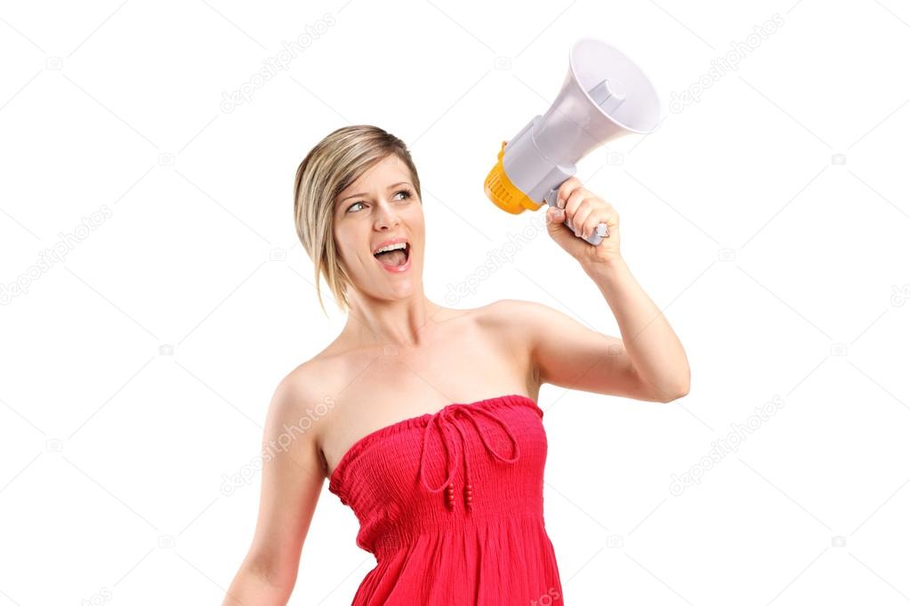 Happy woman speaking on megaphone