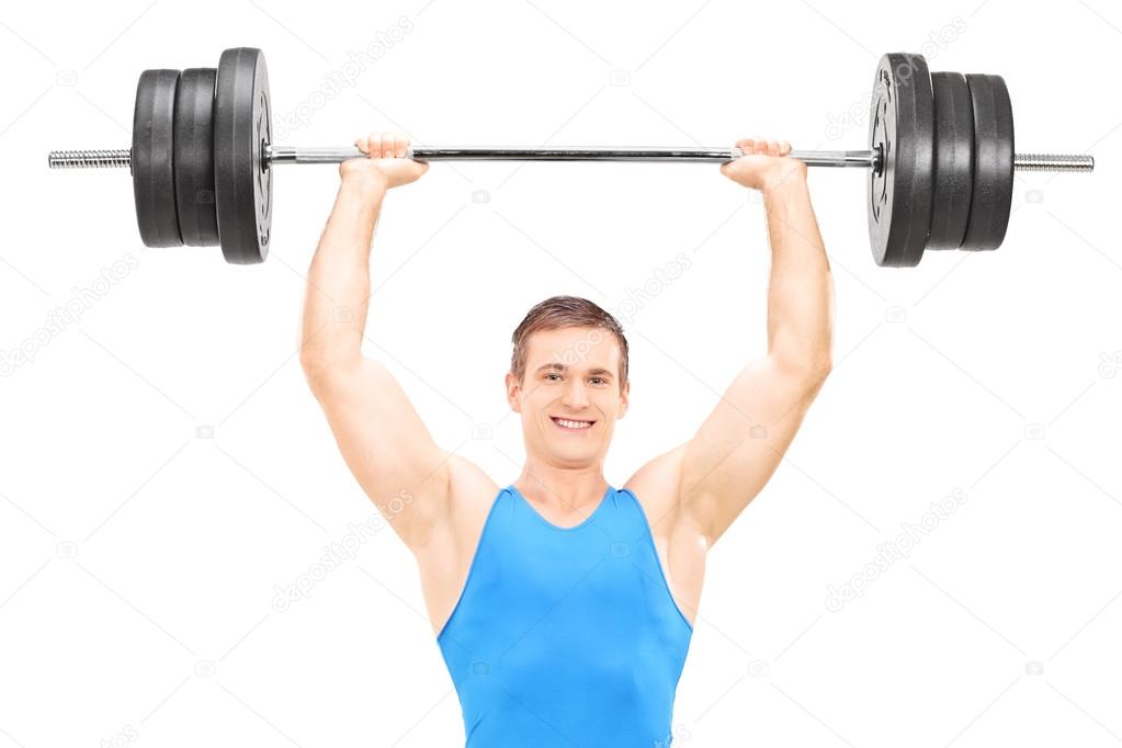 Male weightlifter holding barbell