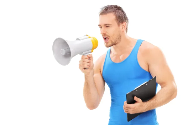 Fitness instructor shouting on megaphone — Stock Photo, Image