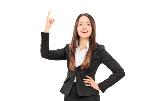 Businesswoman holding her finger up — Stock Photo, Image