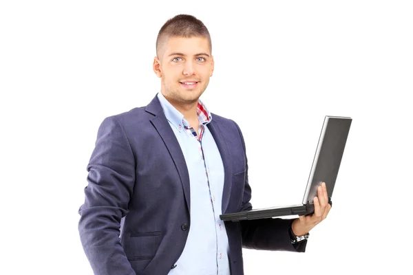 Человек держит ноутбук — стоковое фото