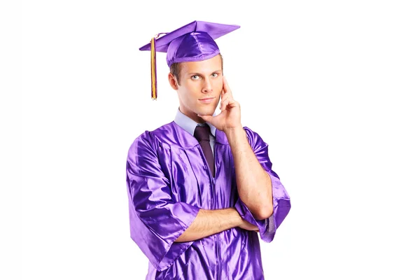 Pensive man in graduation gown — Stock Photo, Image