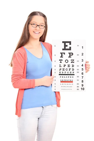 Girl pointing on eyesight test — Stock Photo, Image