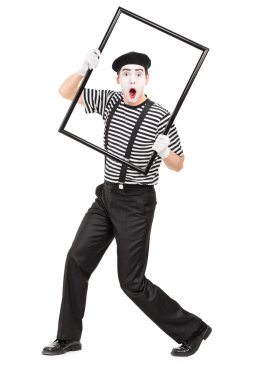 Mime artist holding picture frame clipart