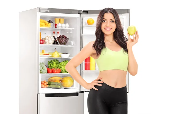 Woman holding apple — Stock Photo, Image