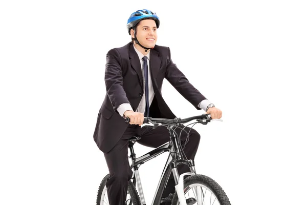 Jeune homme d'affaires à vélo — Photo