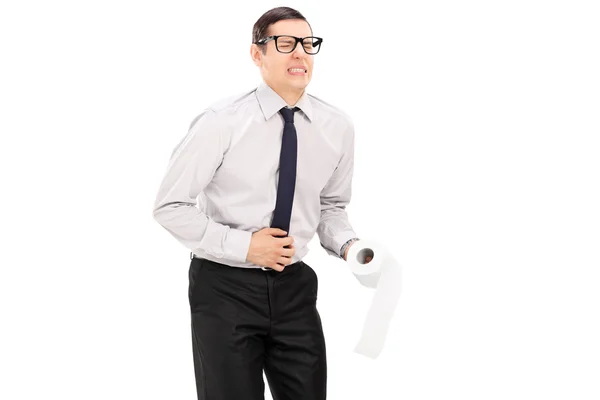 Man holding toilet paper — Stock Photo, Image