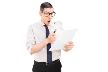 Man looking at document through magnifier clipart