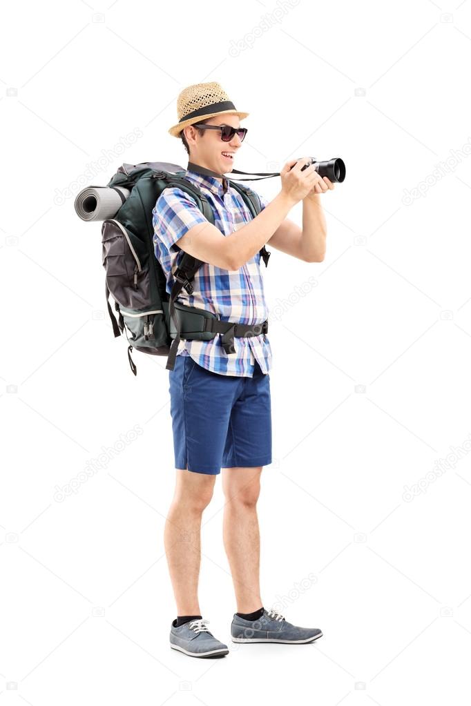 Tourist taking picture with camera