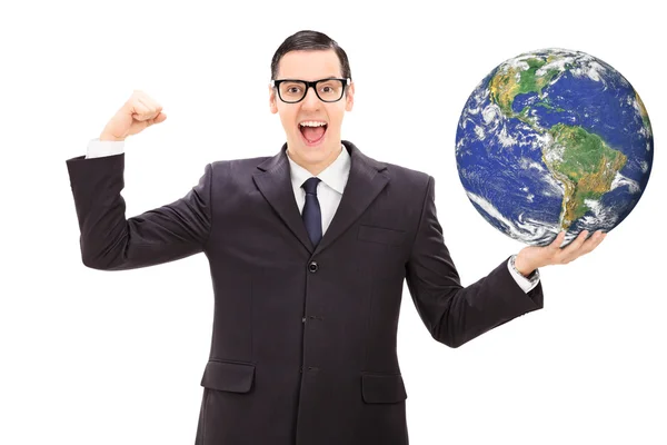 Úspěšný podnikatel drží svět — Stock fotografie
