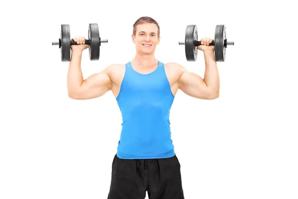 Male bodybuilder exercising with barbells — Stock Photo, Image