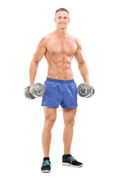 Männlicher Bodybuilder mit zwei Langhanteln — Stockfoto