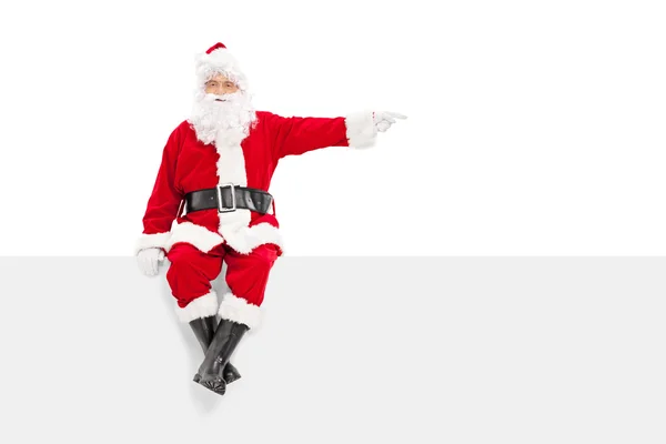 Santa sentado no painel — Fotografia de Stock