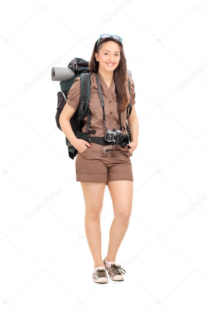 Female traveler with hiking equipment