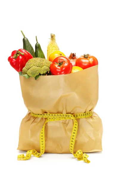 Grocery bag with measuring tape — Stock Photo, Image