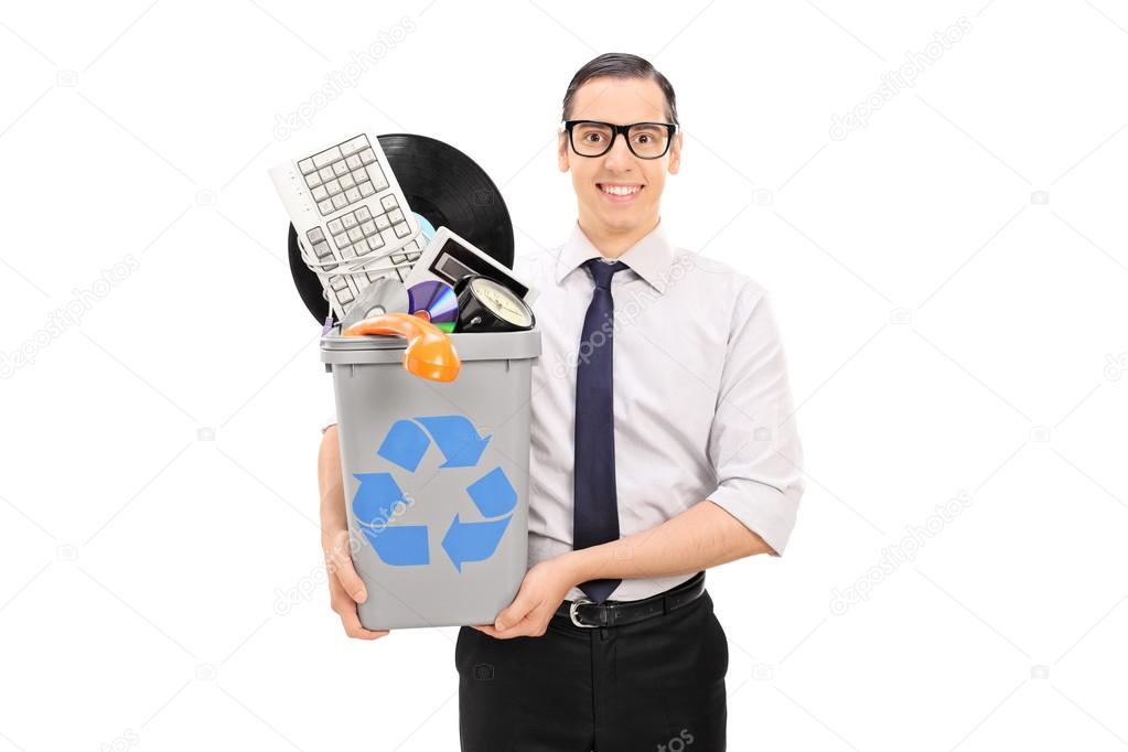 Man holding recycle bin