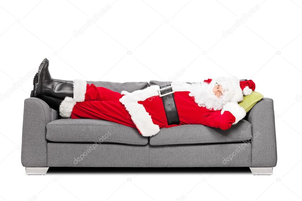 Santa Claus sleeping on sofa