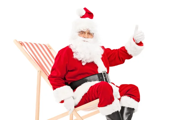 Santa ger tummen upp — Stockfoto