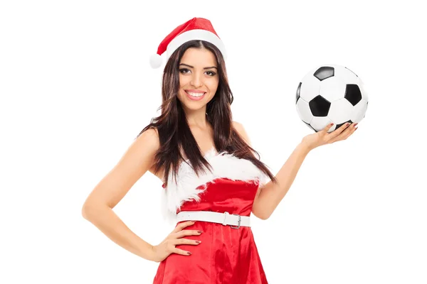 Vrouwelijke Santa Claus houden een voetbal — Stockfoto