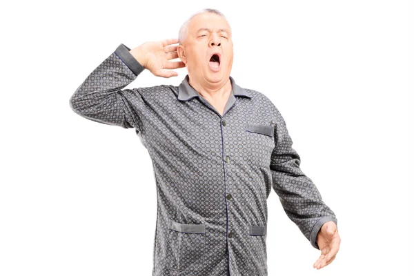 Sleepy senior in pajamas — Stock Photo, Image