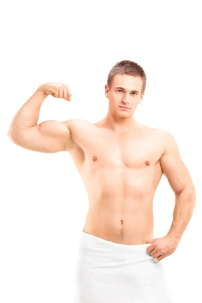 Homem sem camisa mostrando seu bíceps — Fotografia de Stock