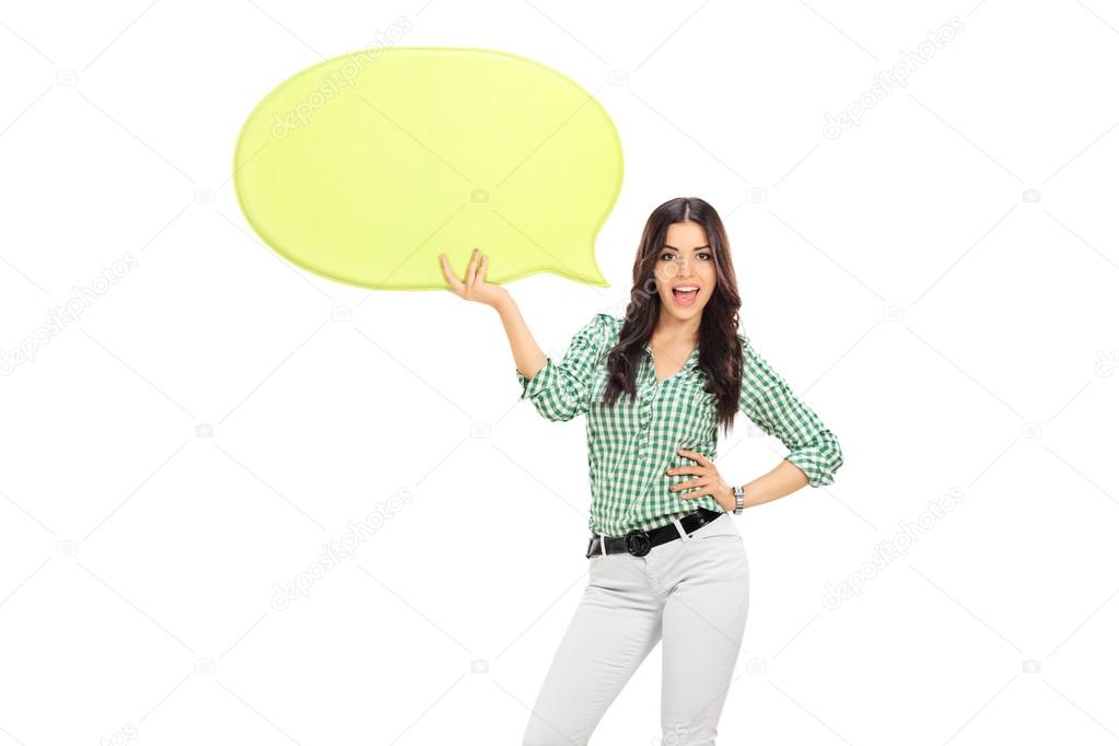 Young girl holding speech bubble