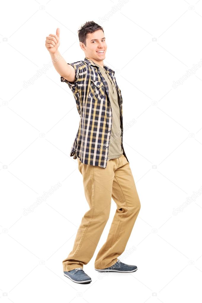 Young guy giving thumb up