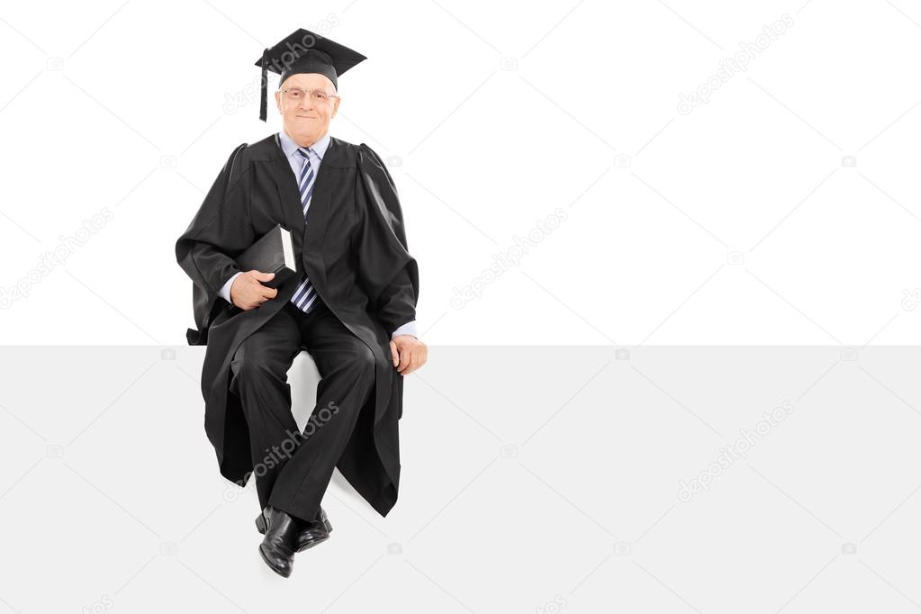 College professor holding book