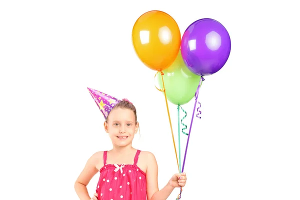 Little girl holding bunch of balloons — Stock Photo, Image