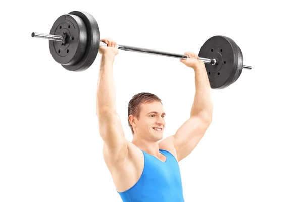 Man lifting barbell — Stock Photo, Image