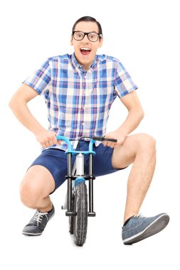 Man riding small childish bike clipart