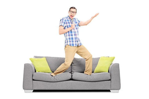 Ecstatic man singing on microphone — Stock Photo, Image