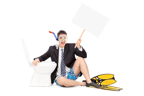 Homem com snorkel segurando banner — Fotografia de Stock