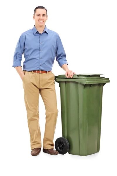 Man standing by trash can — Stock Photo, Image