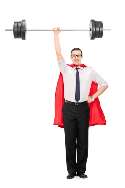 Superhero holding heavy weight — Stock Photo, Image
