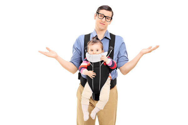 Helpless father carrying baby daughter