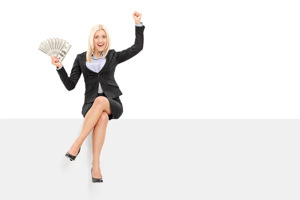 Businesswoman holding money — Stock Photo, Image