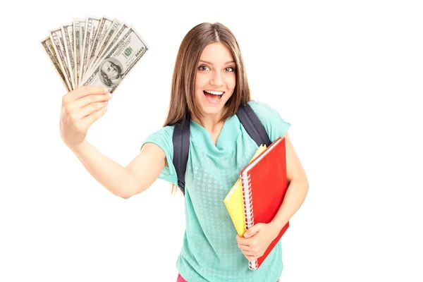 Alegre estudiante sosteniendo dinero — Foto de Stock