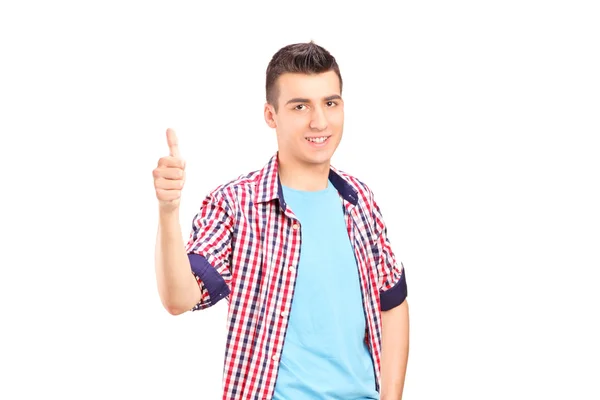 Young guy giving thumb up — Stock Photo, Image