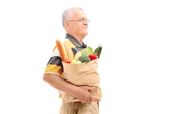 Senior con bolsa de comestibles —  Fotos de Stock