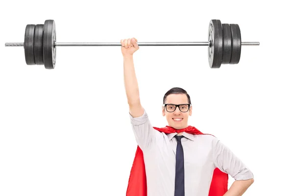 Superhero holding a heavy weight — Stock Photo, Image