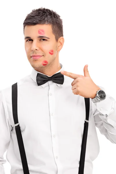 Man covered in kiss marks — Stock Photo, Image